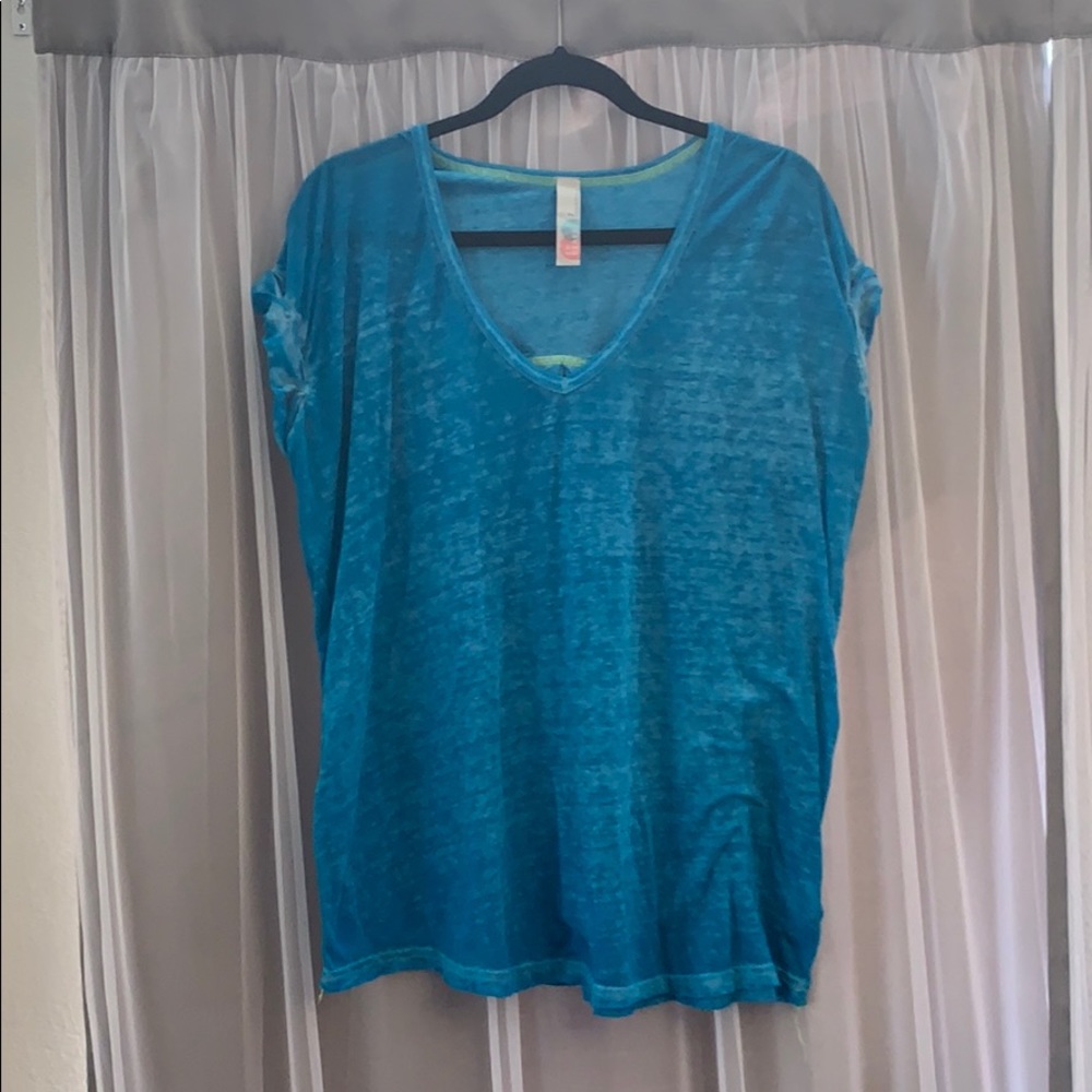 Beach cover up shirt.